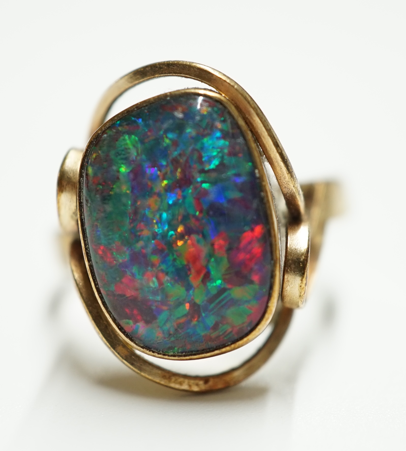 A 9ct? and oval black opal doublet set ring, size Q, gross weight 4.6 grams. Condition - poor